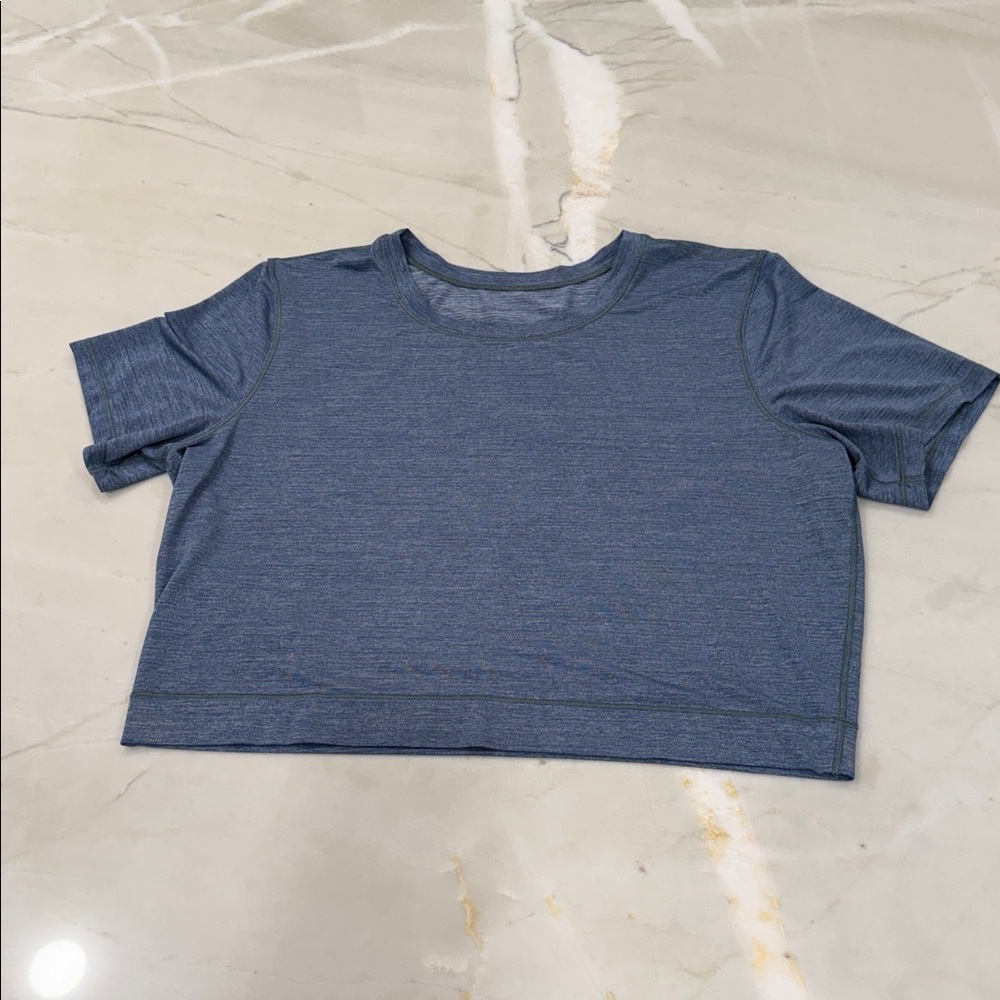 Lululemon size 8 metal vent tech women’s cropped blue shirt